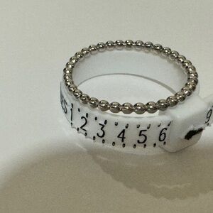 Silver toned dot ring​​​​​​